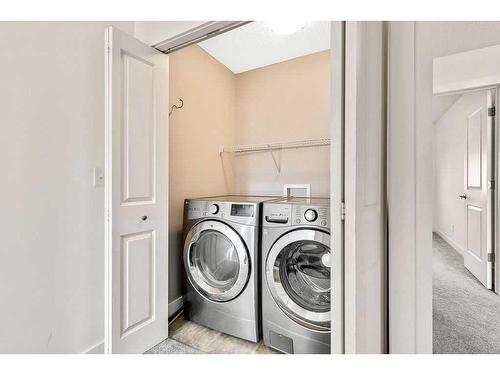 209 Rockyspring Grove Nw, Calgary, AB - Indoor Photo Showing Laundry Room