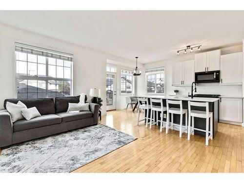 209 Rockyspring Grove Nw, Calgary, AB - Indoor Photo Showing Living Room