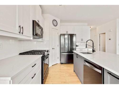 209 Rockyspring Grove Nw, Calgary, AB - Indoor Photo Showing Kitchen With Upgraded Kitchen