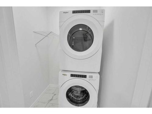 35 Homestead Passage, Calgary, AB - Indoor Photo Showing Laundry Room