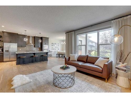 202 Auburn Sound Manor Se, Calgary, AB - Indoor Photo Showing Living Room