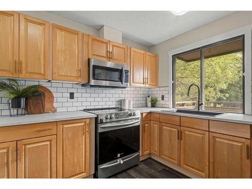 40-10030 Oakmoor Way Sw, Calgary, AB - Indoor Photo Showing Kitchen