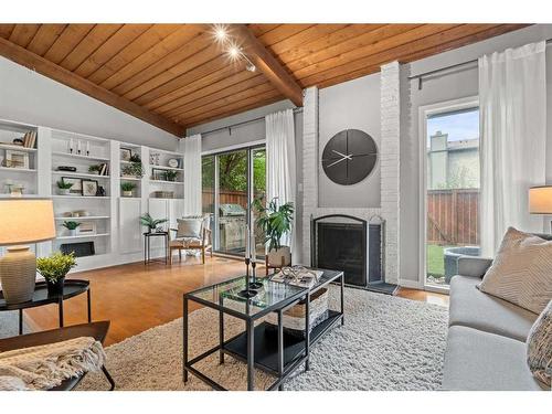 40-10030 Oakmoor Way Sw, Calgary, AB - Indoor Photo Showing Living Room With Fireplace