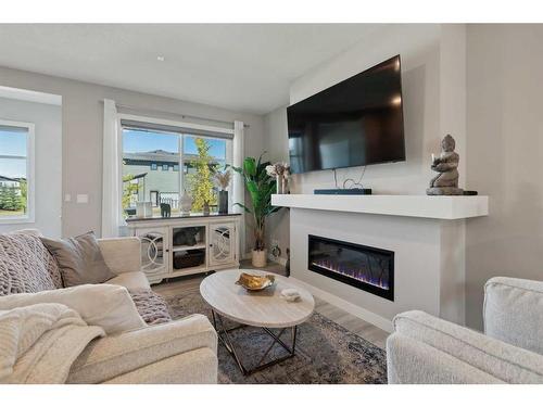 71 Wolf Creek Avenue Se, Calgary, AB - Indoor Photo Showing Living Room With Fireplace