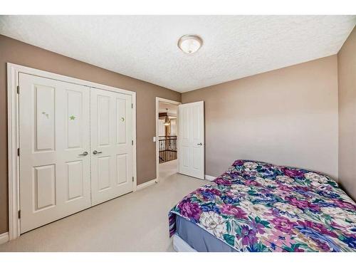 222 Discovery Ridge Way Sw, Calgary, AB - Indoor Photo Showing Bedroom