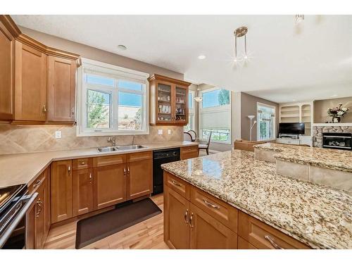 222 Discovery Ridge Way Sw, Calgary, AB - Indoor Photo Showing Kitchen With Double Sink