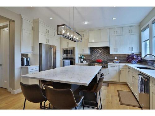 39 Prairie Smoke Rise, Rural Rocky View County, AB - Indoor Photo Showing Kitchen With Stainless Steel Kitchen With Upgraded Kitchen