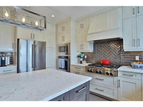 39 Prairie Smoke Rise, Rural Rocky View County, AB - Indoor Photo Showing Kitchen With Stainless Steel Kitchen With Upgraded Kitchen