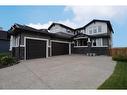 39 Prairie Smoke Rise, Rural Rocky View County, AB  - Outdoor With Facade 