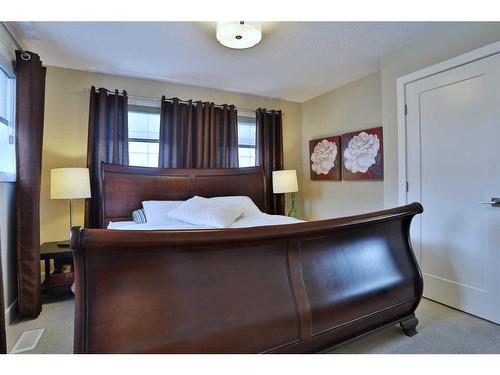 39 Prairie Smoke Rise, Rural Rocky View County, AB - Indoor Photo Showing Bedroom