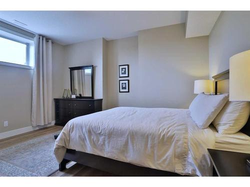 39 Prairie Smoke Rise, Rural Rocky View County, AB - Indoor Photo Showing Bedroom