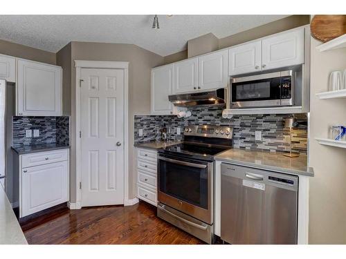 117 Hidden Creek Gardens Nw, Calgary, AB - Indoor Photo Showing Kitchen With Stainless Steel Kitchen