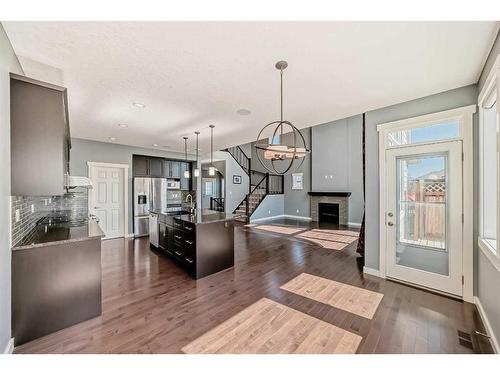 9 Sherwood Street Nw, Calgary, AB - Indoor With Fireplace