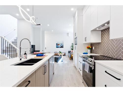 4-3512 15 Street Sw, Calgary, AB - Indoor Photo Showing Kitchen With Double Sink With Upgraded Kitchen