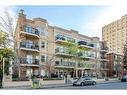 101-323 18 Avenue Sw, Calgary, AB  - Outdoor With Facade 