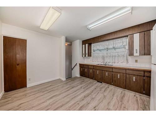 5709 56 Avenue, Red Deer, AB - Indoor Photo Showing Kitchen With Double Sink