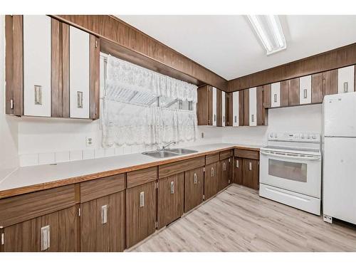 5709 56 Avenue, Red Deer, AB - Indoor Photo Showing Kitchen With Double Sink