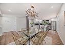 128 Cantrell Place Sw, Calgary, AB  - Indoor Photo Showing Dining Room 