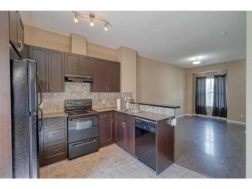 221 Ranch Ridge Meadow, Strathmore, AB - Indoor Photo Showing Kitchen