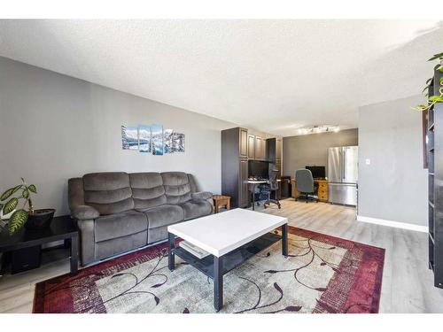 10B-80 Galbraith Drive Sw, Calgary, AB - Indoor Photo Showing Living Room