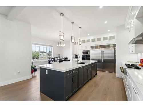 1476 Coopers Landing Sw, Airdrie, AB - Indoor Photo Showing Kitchen With Stainless Steel Kitchen With Upgraded Kitchen