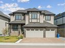 1476 Coopers Landing Sw, Airdrie, AB  - Outdoor With Facade 