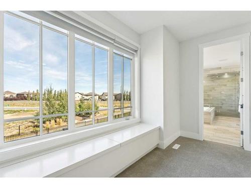 1476 Coopers Landing Sw, Airdrie, AB - Indoor Photo Showing Other Room