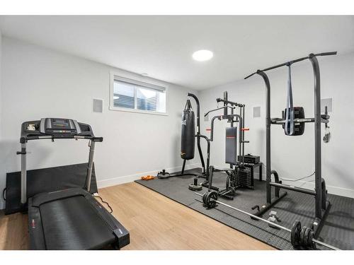 1476 Coopers Landing Sw, Airdrie, AB - Indoor Photo Showing Gym Room