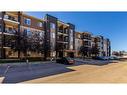 210-7130 80 Avenue Ne, Calgary, AB  - Outdoor With Balcony With Facade 