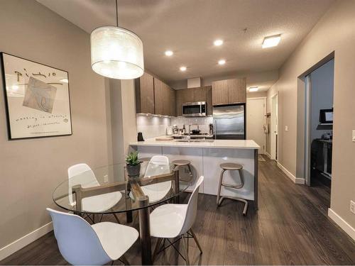 116-823 5 Avenue Nw, Calgary, AB - Indoor Photo Showing Dining Room