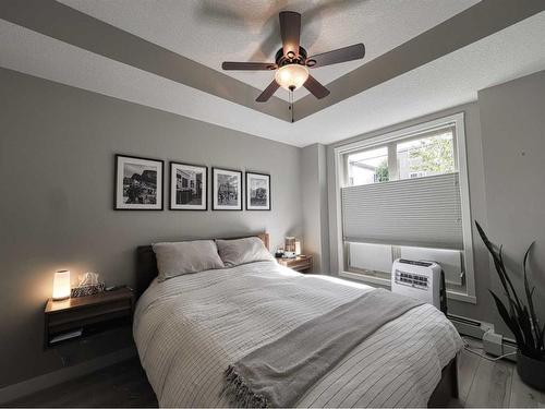 116-823 5 Avenue Nw, Calgary, AB - Indoor Photo Showing Bedroom