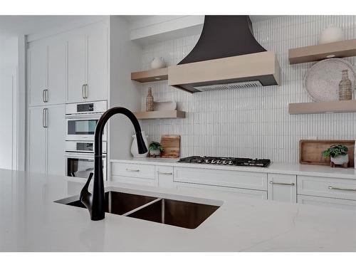 2140 54 Avenue Sw, Calgary, AB - Indoor Photo Showing Kitchen With Double Sink