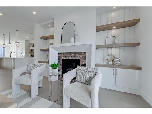 2140 54 Avenue Sw, Calgary, AB - Indoor Photo Showing Living Room With Fireplace