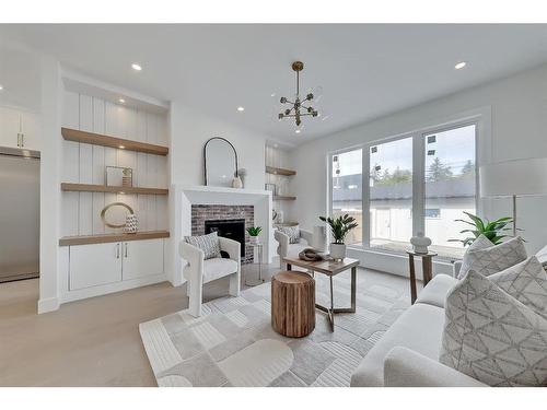 2140 54 Avenue Sw, Calgary, AB - Indoor Photo Showing Living Room With Fireplace