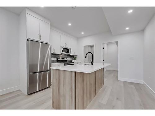 2140 54 Avenue Sw, Calgary, AB - Indoor Photo Showing Kitchen With Stainless Steel Kitchen