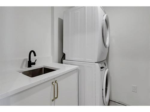 2140 54 Avenue Sw, Calgary, AB - Indoor Photo Showing Laundry Room