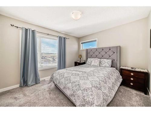 856 Belmont Drive Sw, Calgary, AB - Indoor Photo Showing Bedroom