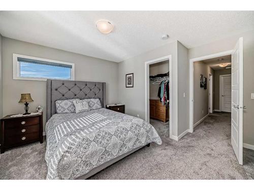 856 Belmont Drive Sw, Calgary, AB - Indoor Photo Showing Bedroom