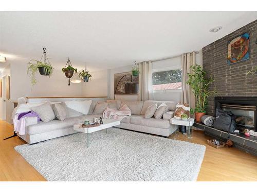 55 Coleridge Crescent Nw, Calgary, AB - Indoor Photo Showing Living Room With Fireplace