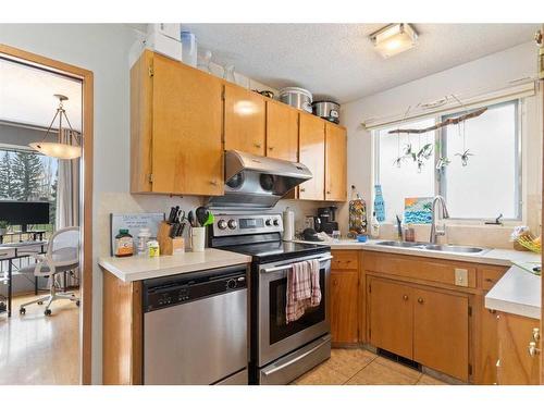 55 Coleridge Crescent Nw, Calgary, AB - Indoor Photo Showing Kitchen With Double Sink