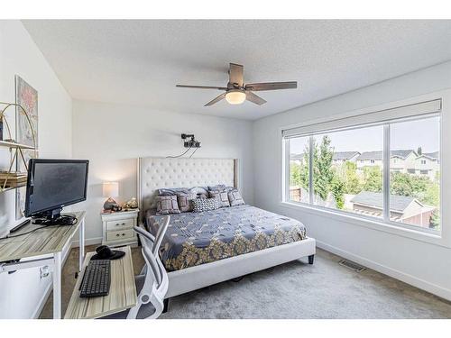 143 New Brighton Close Se, Calgary, AB - Indoor Photo Showing Bedroom