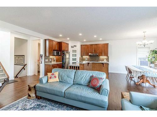 143 New Brighton Close Se, Calgary, AB - Indoor Photo Showing Living Room