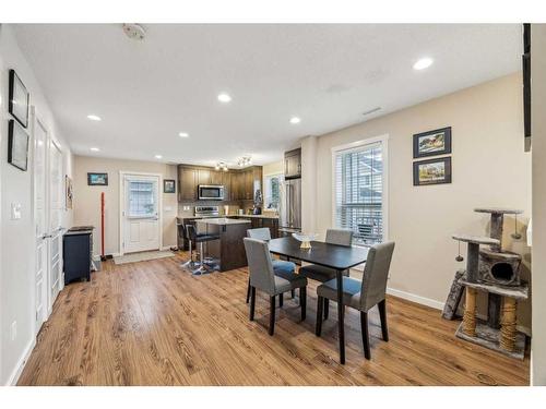 517-2400 Ravenswood View Se, Airdrie, AB - Indoor Photo Showing Dining Room