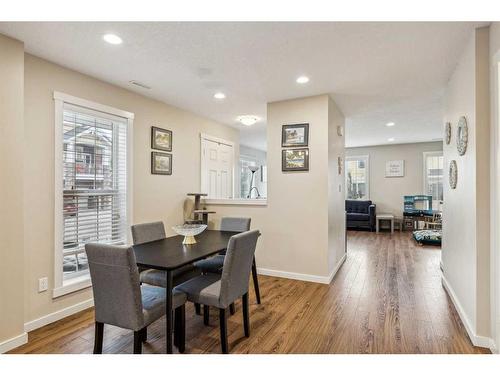 517-2400 Ravenswood View Se, Airdrie, AB - Indoor Photo Showing Dining Room