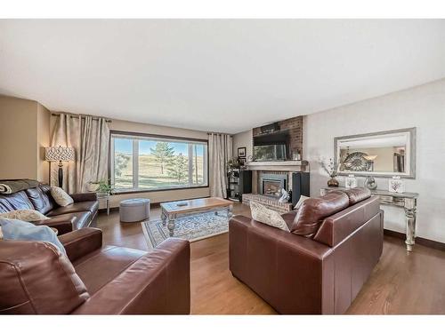 248 Nottingham Road Nw, Calgary, AB - Indoor Photo Showing Living Room With Fireplace