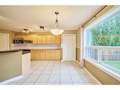 119 Cougar Ridge Drive Sw, Calgary, AB - Indoor Photo Showing Kitchen