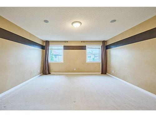 119 Cougar Ridge Drive Sw, Calgary, AB - Indoor Photo Showing Other Room