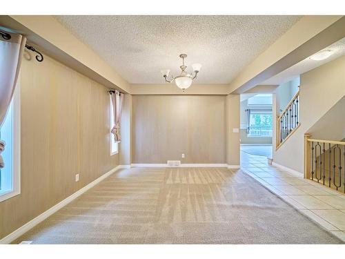 119 Cougar Ridge Drive Sw, Calgary, AB - Indoor Photo Showing Other Room