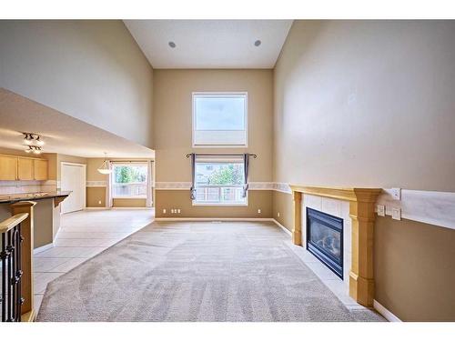 119 Cougar Ridge Drive Sw, Calgary, AB - Indoor With Fireplace