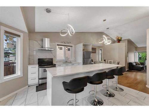 97 Shawinigan Drive Sw, Calgary, AB - Indoor Photo Showing Kitchen With Upgraded Kitchen